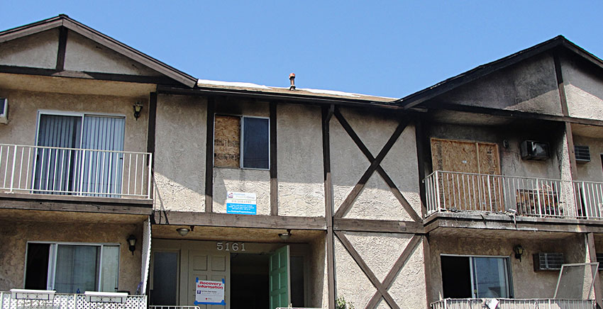 motel with fire damage in the front